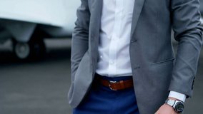 Animation of network of digital icons over caucasian businessman checking time at an airport. Global networking and business technology concept - Powered by Shutterstock - Get 15% off with code: PIKWIZARD15