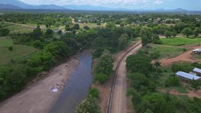 New border wall between Haiti and Dominican Republic close to Dajabon or Massacre river. Aerial forward
