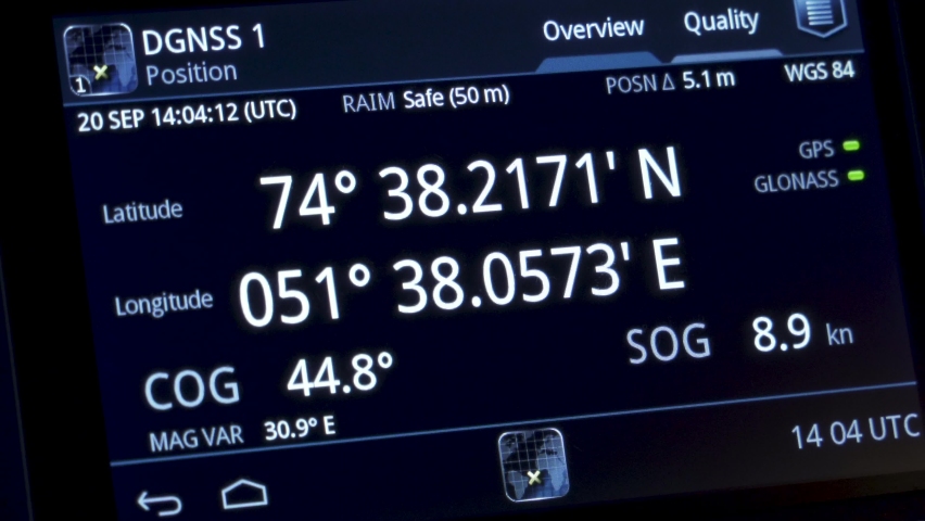 GPS screen: longitude and latitude. Coordinates of vessel on display. Satellite navigation systems on a marine ship. Royalty-Free Stock Footage #1095458247
