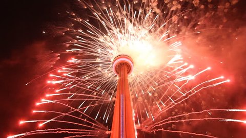 TORONTO, CANADA on JULY 26th: CN Tower with fireworks at closing of PanAm games in Toronto, Canada on July 26th, 2015. The PanAm games were held from July 10 to 26, 2015 in Toronto, Ontario, Canada.
