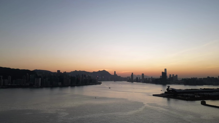 Beautiful sunset over the Victoria bay in Hong Kong, China