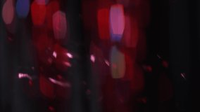 Bokeh glow overlay. Blur disco light. Firework sparks. Night festive glare. Defocused neon red blue color shiny flecks motion on dark black abstract background. - Powered by Shutterstock - Get 15% off with code: PIKWIZARD15