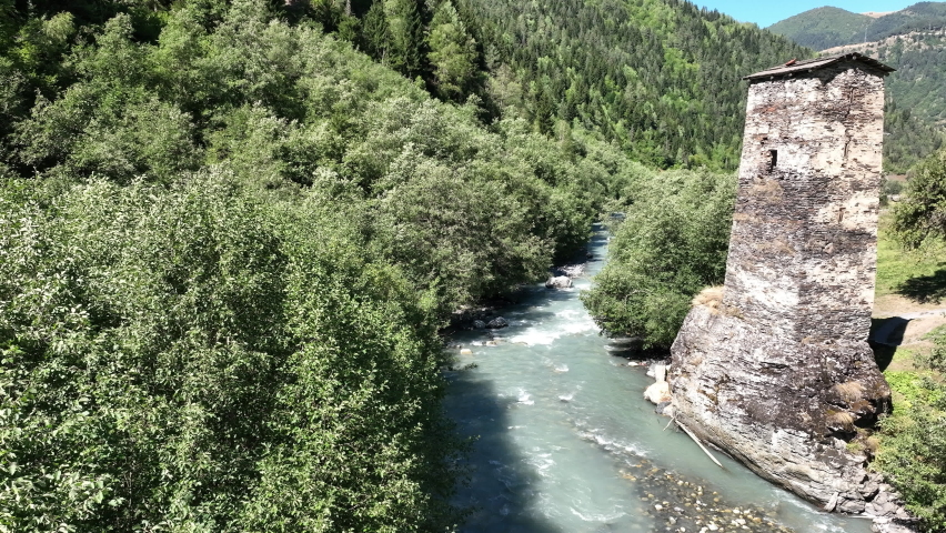 Aerial view of Tower of Love in Village Kala on the road that separates Mestia from Ushguli, the most remote village in the Caucasus mountains, in the Svaneti region of Georgia.