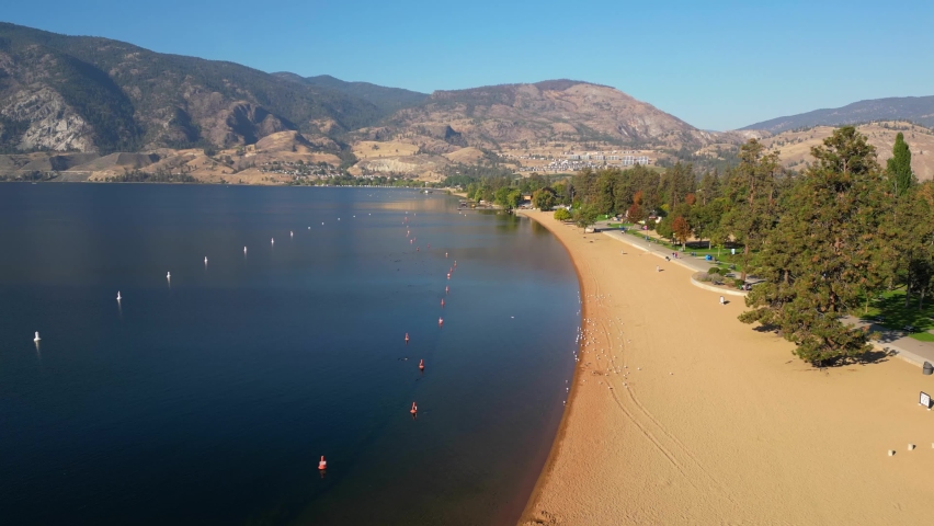 An elevated drone view of Skaha Lake Beach located in the Okanagan Valley, Penticton, British Columbia, Canada.