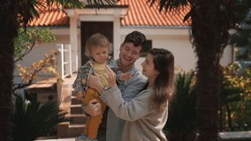 Young married couple or toddler family buy new house. Happy man woman kid or owners shake key in air and hug each other with child in newly bought home. Excited clients purchasing estate or apartment. - Powered by Shutterstock - Get 15% off with code: PIKWIZARD15