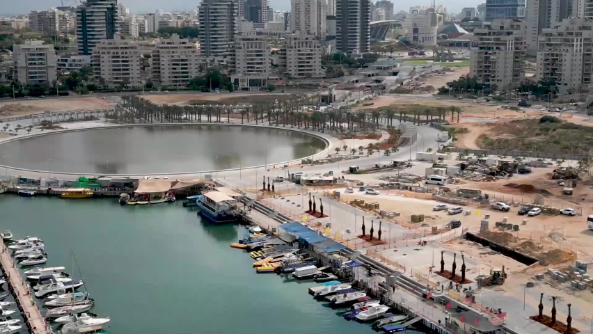 Beautiful aerial 4k panoramic view of Ashdod city and Marina during an overcast cloudy day- Ashdod Israel