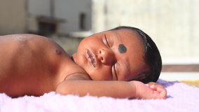 New Born Baby Laying On Direct Sunlight. Sun Exposure in Children Benefits of increased Vitamin D, Serotonin Levels, Insulin Levels, Manages Jaundice, and Higher Energy Levels. - Powered by Shutterstock - Get 15% off with code: PIKWIZARD15