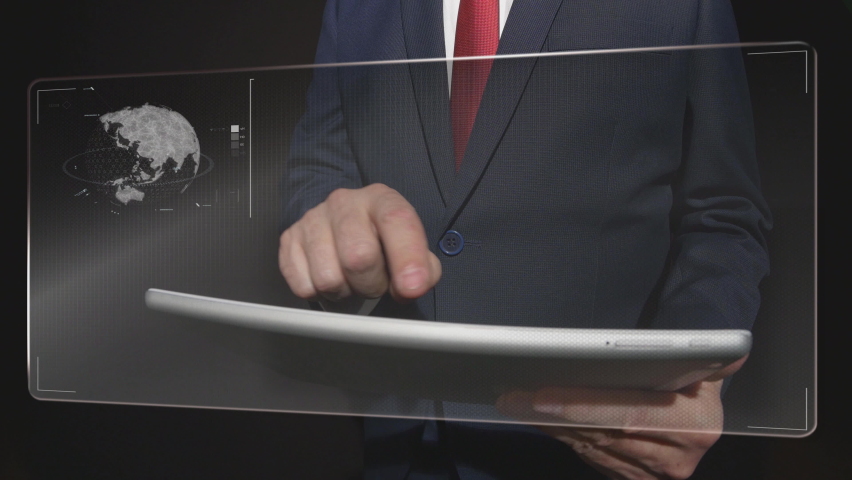 Businessman looking at finance data on a big screen