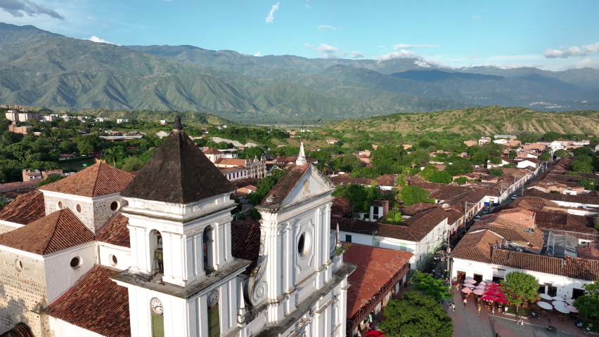 Santa Fe De Antioquia, Colombia. Flying Above Metropolitan Cathedral Towers and Colonial Buildings