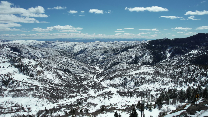 Aerial View of Book Cliffs, Western Colorado, Snow Capped Landscape on Bright Winter Day