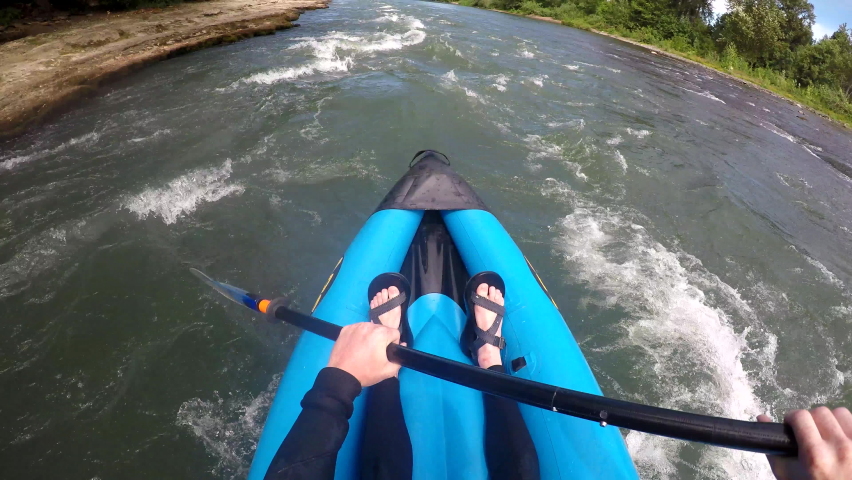 Going down the river. Kayak down a River.