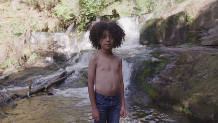 Shirtless Little Boy In Nature