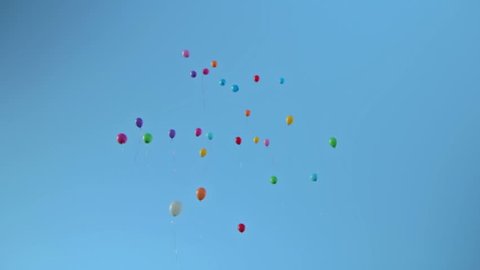 Balloons flying in the blue sky