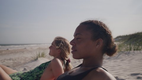 Girl Friends Hanging Out at the Beach on a Sunny Day Arkistovideo