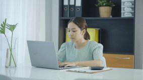 Asian woman working at home, working from home freelancer concept. teleconference online.