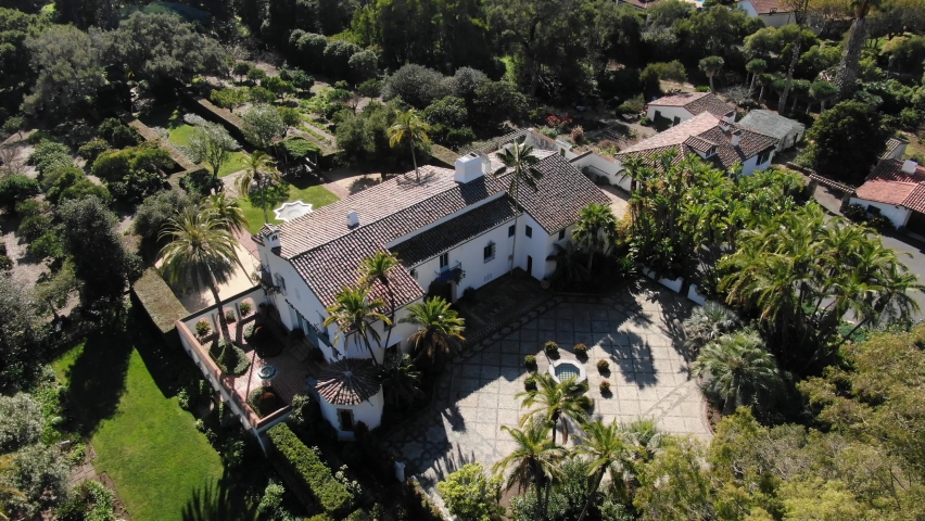 High angle aerial of Casa del Herrero historical mission museum in Montecito, California in summer