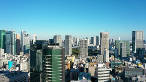 Aerial view 4k video by drone of building in Tokyo city, Japanの動画素材