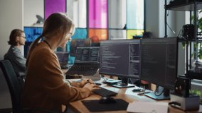 Caucasian Woman Writes Lines of Code on Desktop PC with Multiple Displays and a Laptop in Stylish Office. Professional Female Data Scientist Using Software To Analyze Information from Internet. - Powered by Shutterstock - Get 15% off with code: PIKWIZARD15