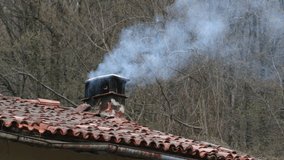 Old House in Countryside Rooftop Fireplace Smoking Steam Close Up in Winter