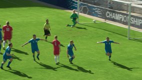 Football Championship: Blue Team Forward Shots Penalty, Kicks the Ball and Scores the Goal. Goalkeeper Fails to Catch Ball. Winning the Match and Game, Players Celebrate Tournament Victory - Powered by Shutterstock - Get 15% off with code: PIKWIZARD15