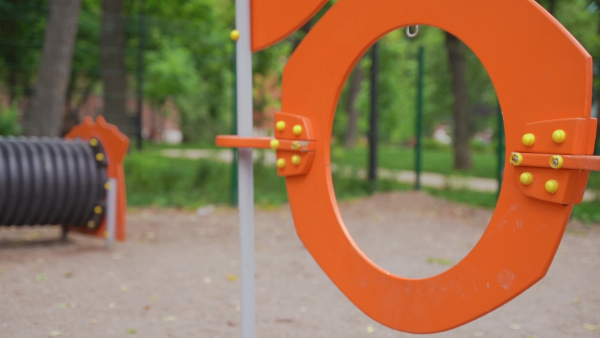 white purebred dog jumps over an obstacle