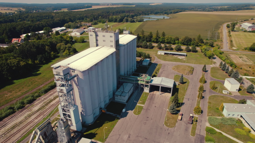 Agricultural products magazines in Lubycza Krolewska. Fields forests and villages. Vast modern farmscape. Food industry and agriculture. horizontal shot. High quality 4k footage