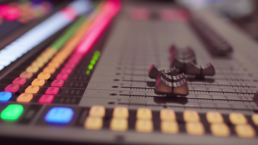 Audio mixer, mixing desk, electronic devise for mixing audio signals, for sound recording