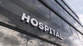 Hospital sign on a modern glass skyscraper. Hospital glass building. Health, clinic, emergency, healthcare and medical concept - Powered by Shutterstock - Get 15% off with code: PIKWIZARD15