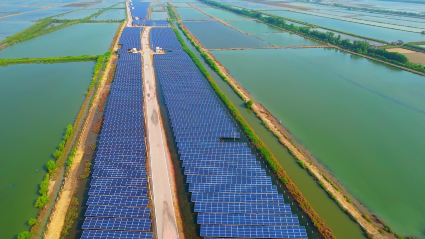 Solar panels and salt fields. Innovation of renewable clean energy for the environment. Renewable electric energy industry. aerial view from drone. 4k
 Royalty-Free Stock Footage #1095774811