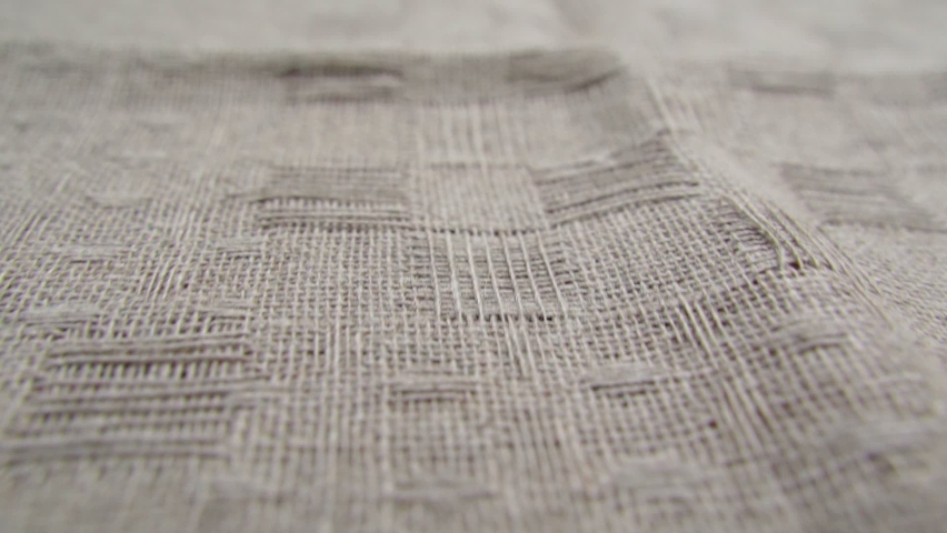 Linen texture background, Abstractthread on a linen fabric. Clothing Factory, Textile Industry. Selective focus Royalty-Free Stock Footage #1095791377