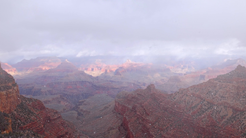 Winter snow storm at the Grand Canyon National Park in Arizona. Snow Motion.