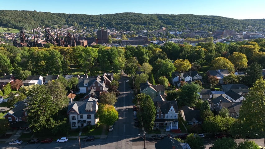 Residential housing district. Lehigh Valley Pennsylvania. Bethlehem PA homes in early autumn. Descending aerial.