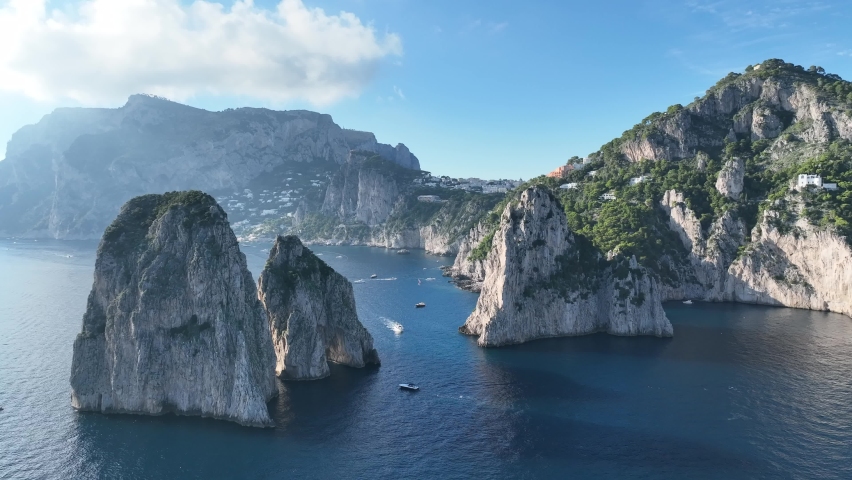 The famous Faraglioni of the island of Capri. Italy, Gulf of Naples.
Aerial view of the most visited exclusive island in the world. Royalty-Free Stock Footage #1095803495