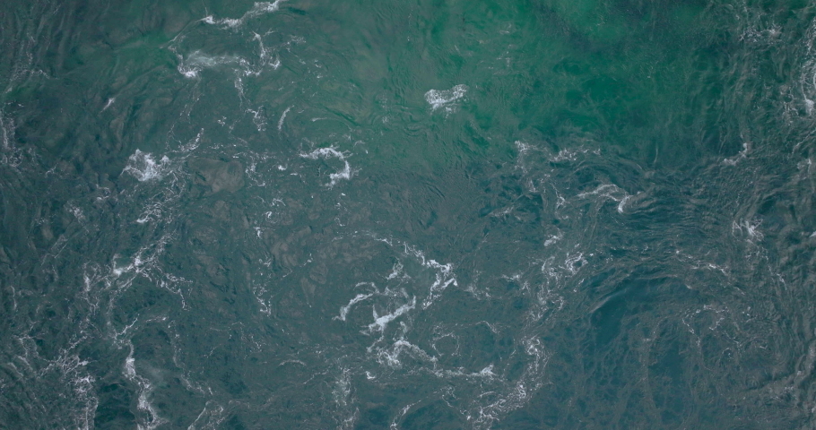 Ocean waves on coast of Norway. Top down birds eye view aerial shot Royalty-Free Stock Footage #1095807717