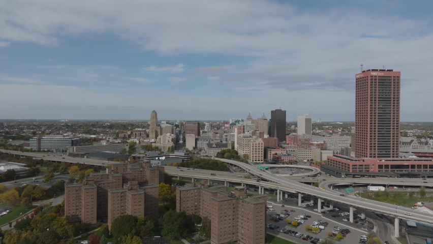 view of Buffalo NY descending revealing Navy ship in Lake Erie