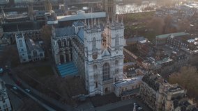 Establishing Aerial View Shot of London UK, United Kingdom, Westminster Abbey, slow circling right, nice light