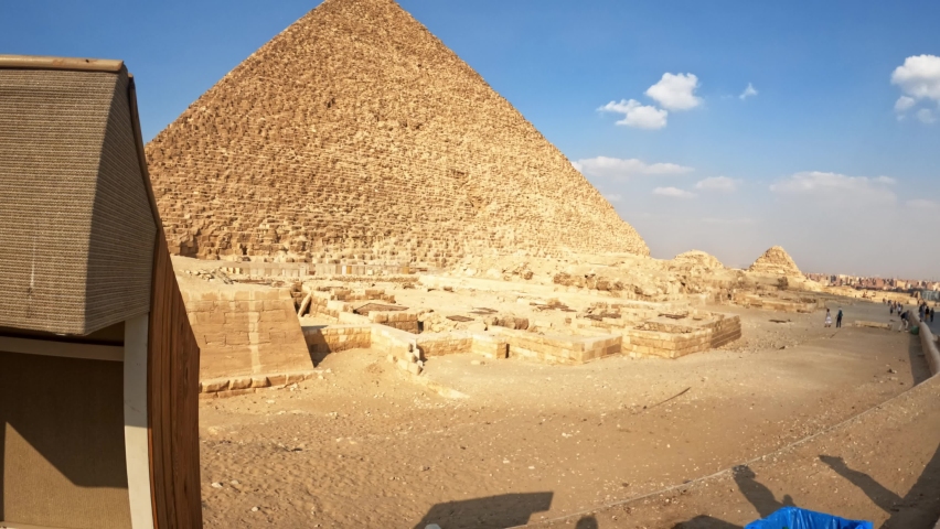 Close up view of pyramid of giza in egypt walking beside the masssive stone structure Royalty-Free Stock Footage #1095828827