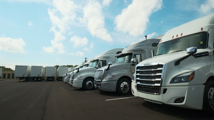 Trucks stand in the parking lot. move camera footage Royalty-Free Stock Footage #1095839761