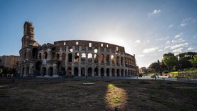 Hyper lapse with Colosseum and Arch of Constantine at sunrise.