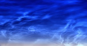 Timelapse of beautiful blue sunset sky turning to blue evening sky, cloudscape footage, clouds time lapse, beautiful cloudy motion.