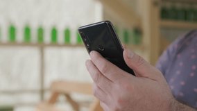 Women holding cell phone using smartphone device in a street cafe. Woman blogger subscribing new social media, buying in internet, ordering products online in apps. - Powered by Shutterstock - Get 15% off with code: PIKWIZARD15