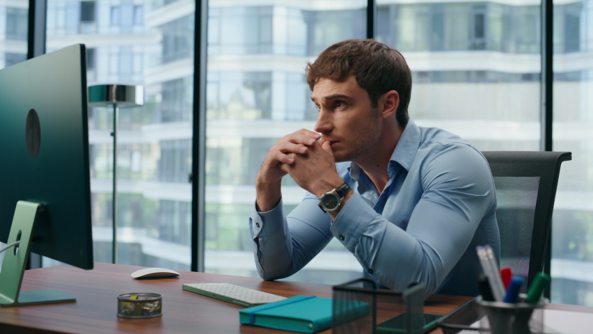 Nervous man worried data statistics closeup. Stressed corporate worker counting sitting office desk alone. Young businessman analyzing company financial results at panoramic windows workplace  Royalty-Free Stock Footage #1095869429