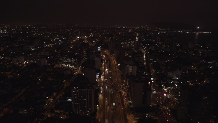 Excellent night aerial view of Av. Alfredo Benavides and Vía Expresa Luis Bedoya Reyes in the city of Lima, Peru