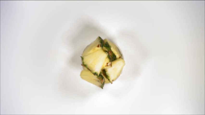 Super Slow Motion of Explosion Pineapple and Burst Water and Slices