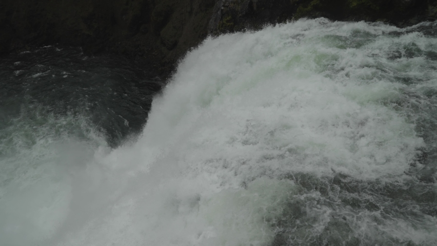 Brink Of The Upper Falls Waterfall View and Yellowstone River at Grand Canyon of the Yellowstone National Park, Wyoming in Morning Fog