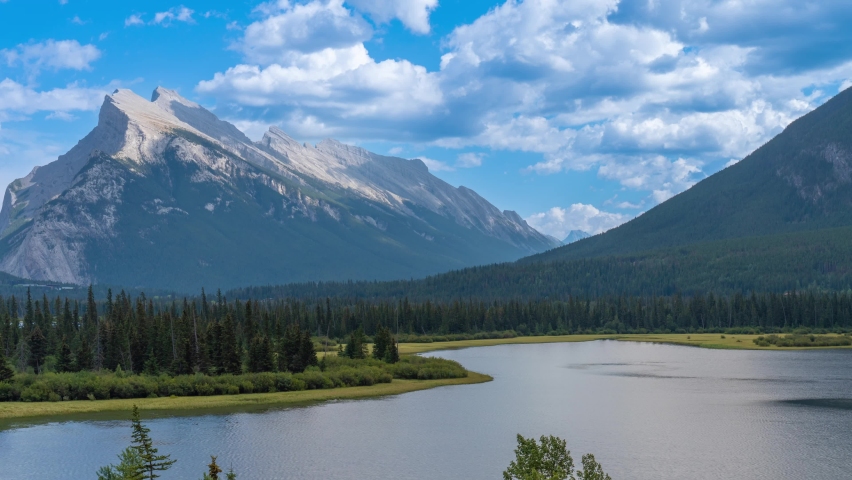4K time-lapse UHD video of Vermilion Lakes with Mount Rundle and Sulphur Mountain in the background, Alberta, Canada. summer autumn foliage scenery in Banff National Park, Canadian Rockies
