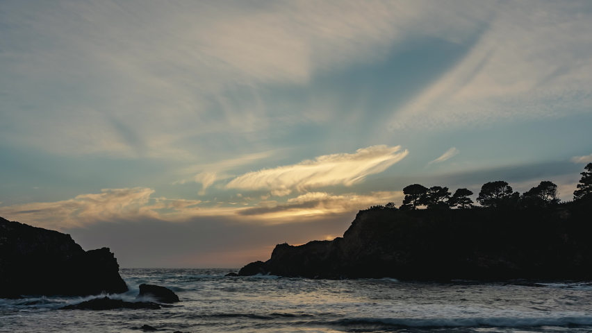 Beautiful sunset with silhouetted rocks on the coastline - timelapse
Buckhorn Cove, Little River, California, USA