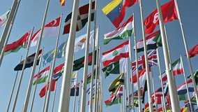Waving flags at the Flag Plaza, displays 119 flags from countries with authorized diplomatic missions - Powered by Shutterstock - Get 15% off with code: PIKWIZARD15