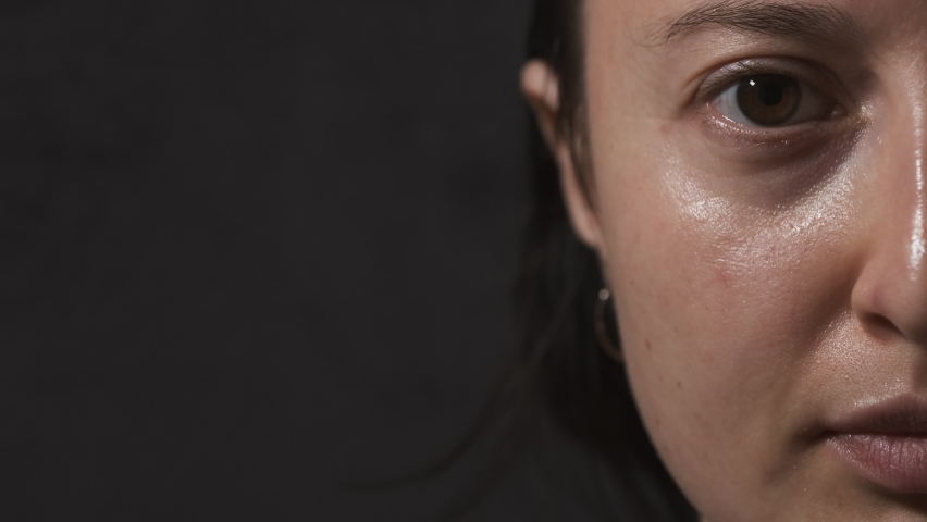 Supporter Painting Face and Looking at Camera. Football Fan Preparing for the Match. Colored Face with Flag Colors Blue and White. Slow Motion 4K Prores 422