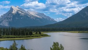 4K time-lapse UHD video of Vermilion Lakes with Mount Rundle and Sulphur Mountain in the background, Alberta, Canada. summer autumn foliage scenery in Banff National Park, Canadian Rockies